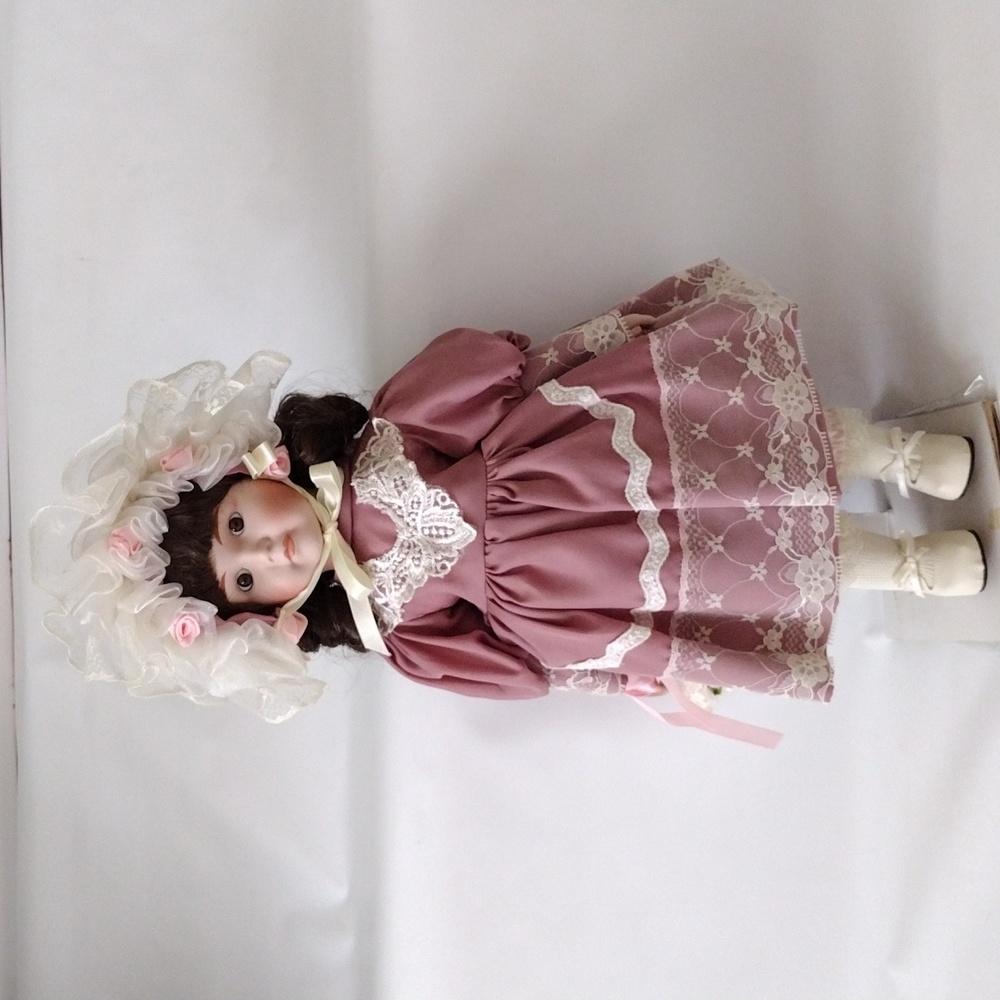 HEIRLOOM TREASURE PORCELAIN DOLL